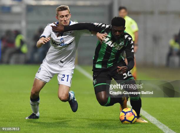 Timothy Castagne of Atalanta BC and Alfred Duncan of US Sassuolo in action during the serie A match between US Sassuolo and Atalanta BC at Mapei...