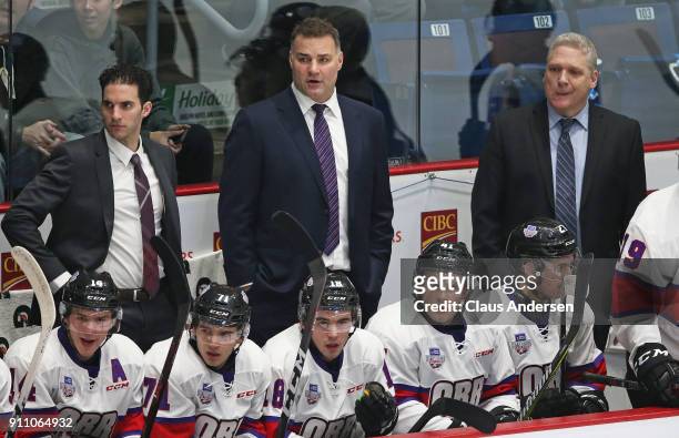 Coaches Luca Caputi, Eric Lindros, and George Burnett of Team Orr watch the action against Team Cherry in the 2018 Sherwin-Williams CHL/NHL Top...