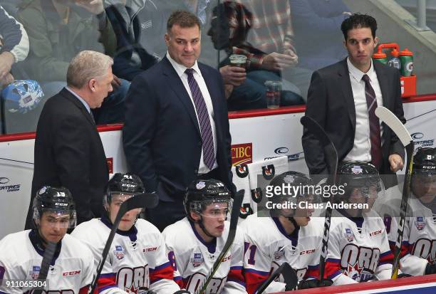 Coaches George Burnett, Eric Lindros, and Luca Caputi of Team Orr patrol the bench against Team Cherry in the 2018 Sherwin-Williams CHL/NHL Top...