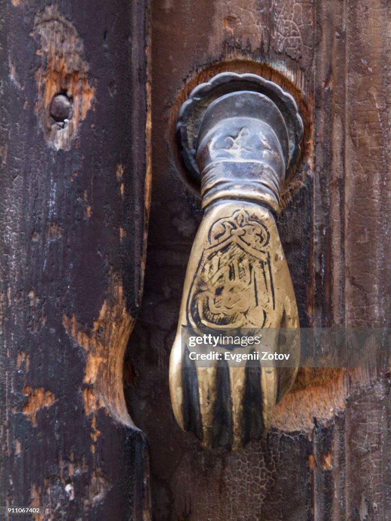 Old metallic door knob shaped as "Hand of Fatima". Damascus, Syria