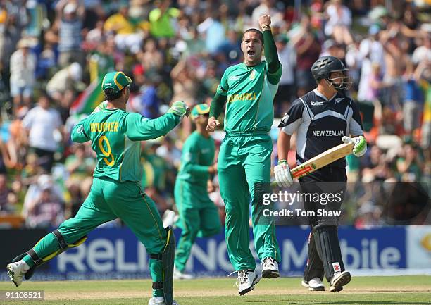 Wayne Parnell of South Africa celebrates taking the wicket of Jesse Ryder of New Zealand during the ICC Champions Trophy Group B match between South...