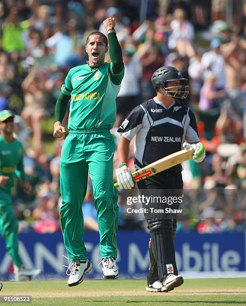 Wayne Parnell of South Africa celebrates taking the wicket of Jesse Ryder of New Zealand during the ICC Champions Trophy Group B match between South...