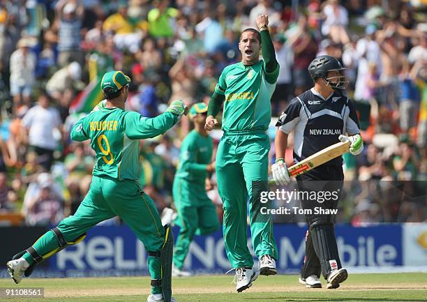 Wayne Parnell of South Africa celebrates taking the wicket of Jesse Ryder of New Zealand during the ICC Champions Trophy Group B match between South...