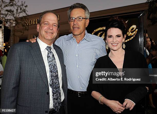 S Erik Loomis, producer Tom Rosenberg and actress Megan Mullally arrive at the premiere of MGM Pictures' "Fame" at the Pacific Grove Theaters on...