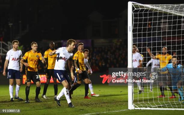 Harry Kane of Tottenham Hotspur scores his sides first goal during The Emirates FA Cup Fourth Round match between Newport County and Tottenham...