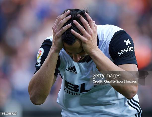 Martin Montoya of Valencia reacts during the La Liga match between Valencia and Real Madrid at Mestalla stadium on January 27, 2018 in Valencia,...