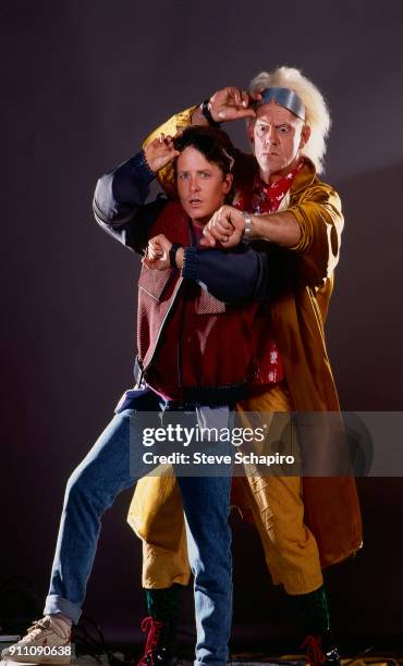 Promotional portrait of Canadian-American actor Michael J Fox and American actor Christopher Lloyd in costume for their film 'Back to the Future 2' ,...