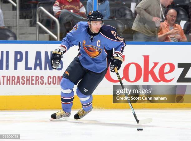 Ilya Kovalchuk of the Atlanta Thrashers carries the puck during the preseason game against the Nashville Predators at Philips Arena on September 23,...