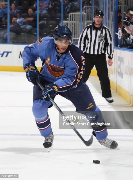 Evander Kane of the Atlanta Thrashers carries the puck during the preseason game against the Nashville Predators at Philips Arena on September 23,...