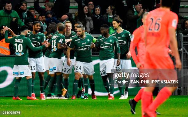 Saint-Etienne's French forward Paul-Georges Ntep celebrates with teammates after scoring a goal during the French L1 football match between...