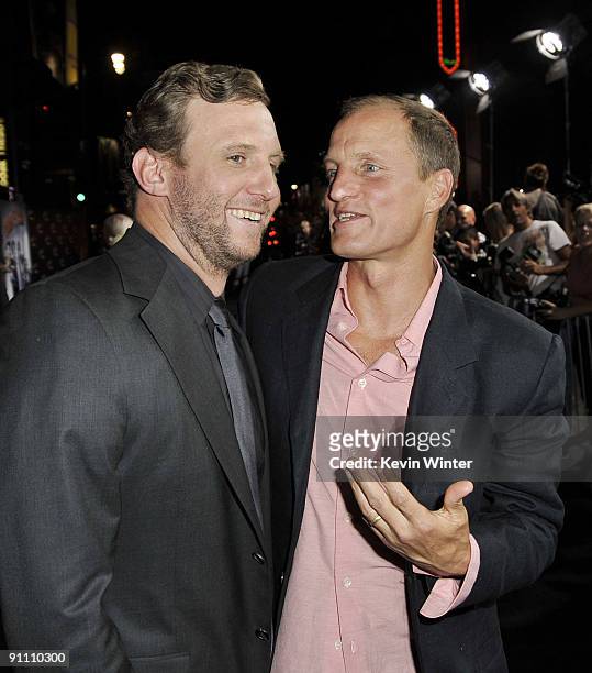 Director Ruben Fleischer and actor Woody Harrelson arrive at the premiere of Sony Pictures' "Zombieland" at the Chinese Theater on September 23, 2009...