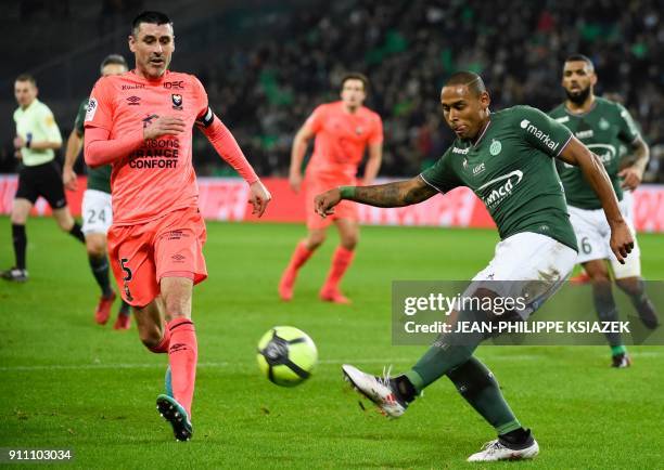 Saint-Etienne's Brazilian midfielder Gabriel Antunes Da Silva kicks the ball past Caen's French midfielder Julien Feret during the French L1 football...