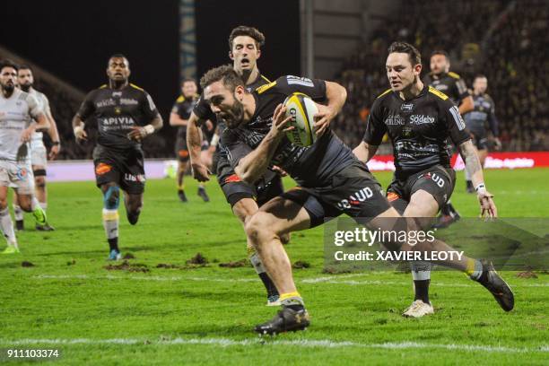 La Rochelle's French wing Eliott Roudil scores a try during the French Top 14 rugby union match between La Rochelle and Brive on January 27, 2018 at...