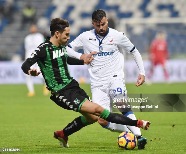 Edoardo Goldaniga of US Sassuolo and Andrea Petagna of Atalanta BC in action during the serie A match between US Sassuolo and Atalanta BC at Mapei...