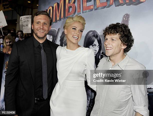 Director Ruben Fleischer, actors Amber Heard and Jesse Eisenberg arrive at the premiere of Sony Pictures' "Zombieland" at the Chinese Theater on...