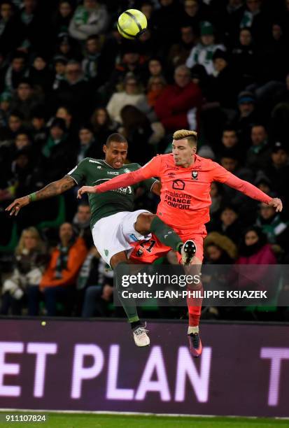 Caen's French defender Frederic Guilbert vies with Saint-Etienne's Kevin Monnet-Paquet during the French L1 football match Saint-Etienne vs Caen on...