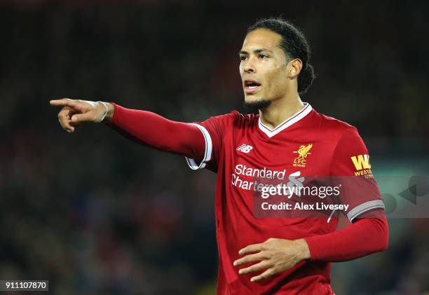 Virgil van Dijk of Liverpool reacts during The Emirates FA Cup Fourth Round match between Liverpool and West Bromwich Albion at Anfield on January...