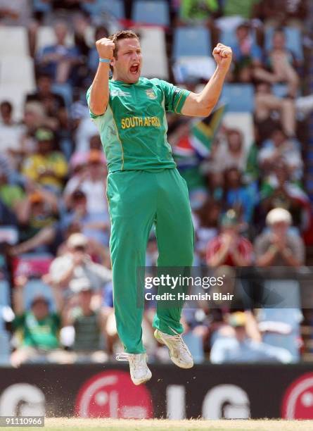 Roelof van der Merwe of South Africa celebrates the wicket of Neil Broom of New Zealand during the ICC Champions Trophy Group B match between South...