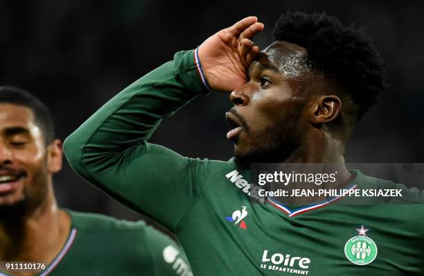 Saint-Etienne's French forward Jonathan Bamba celebrates after scoring a goal during the French L1 football match Saint-Etienne vs Caen on January 27...