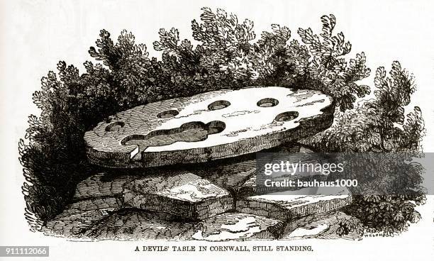 devil's table in cornwall, england engraving - devils marbles stock illustrations