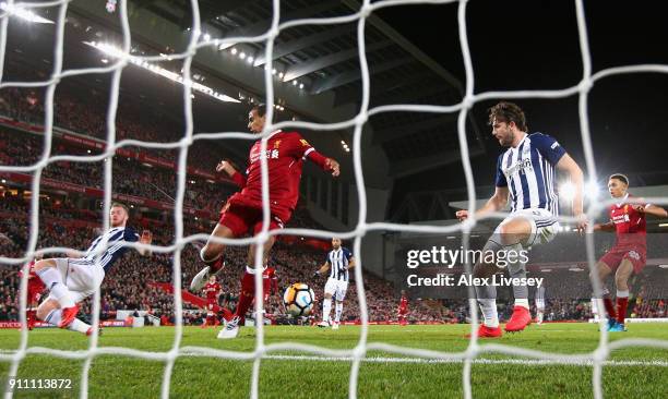 Jay Rodriguez of West Bromwich Albion watches on as Joel Matip of Liverpool scores an own goal during The Emirates FA Cup Fourth Round match between...