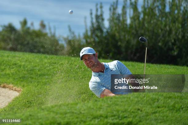Harris English plays a shot from a bunker on the fourth hole during the third round of the Farmers Insurance Open at Torrey Pines South on January...
