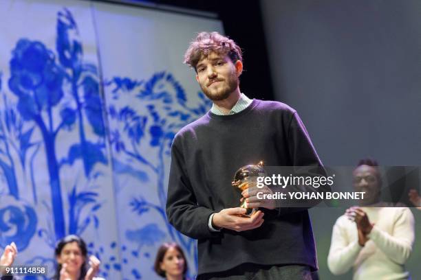 French comic book author Jeremie Moreau looks on after winning the Fauve d'Or best comic book award for his comic book "La saga de Grimr" during the...