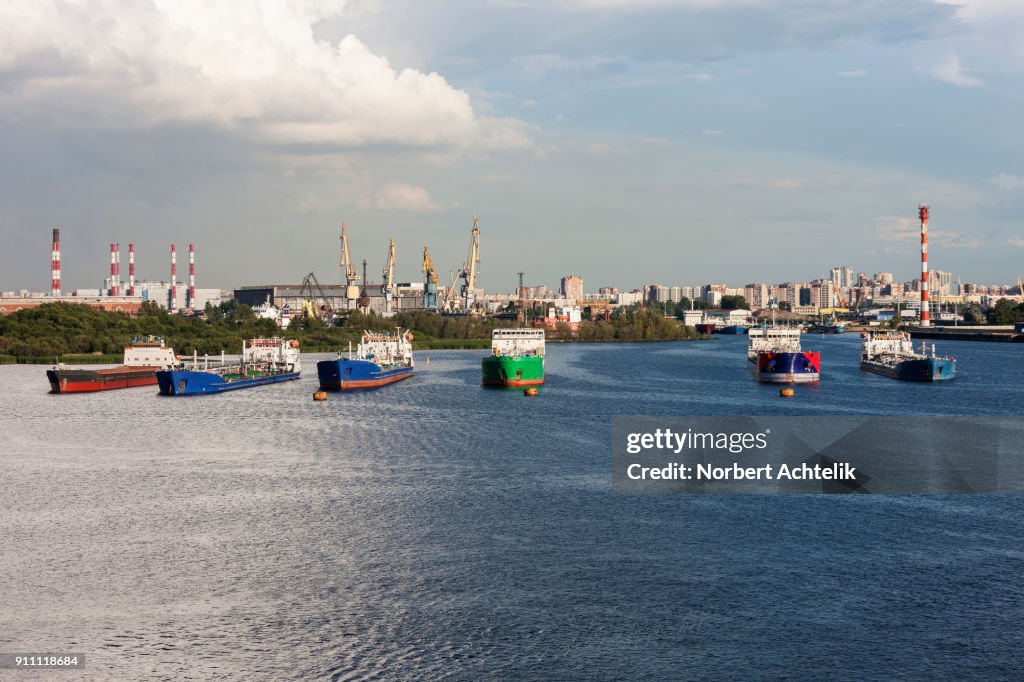 Oil tanker ships and cranes at Merchants Harbor, Saint Petersburg, Russia