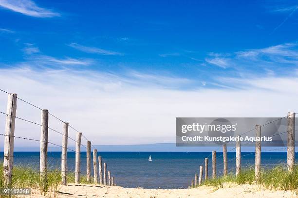 sea with boat - zandvoort stock-fotos und bilder