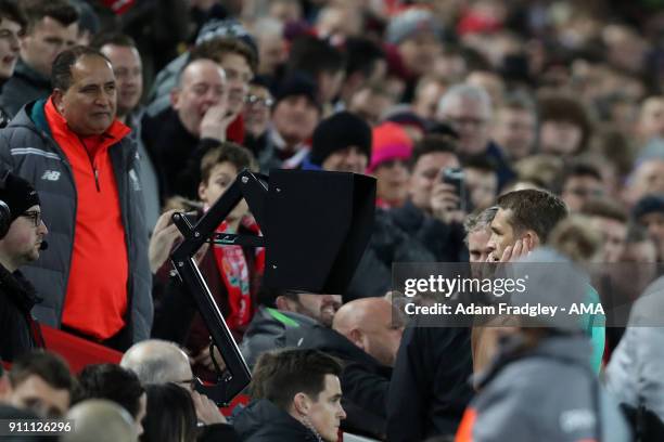 Referee Craig Pawson watches the VAR / Video Assistant Referee Screen to decide to award a penalty to Liverpool during the The Emirates FA Cup Fourth...