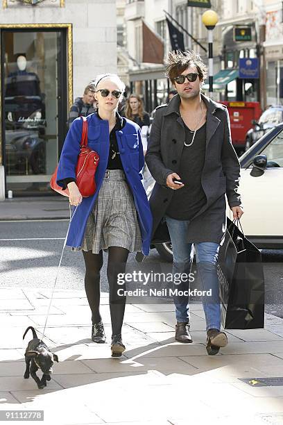 Portia Freeman and Pete Denton shop at Dolce & Gabbana on September 24, 2009 in London, England.