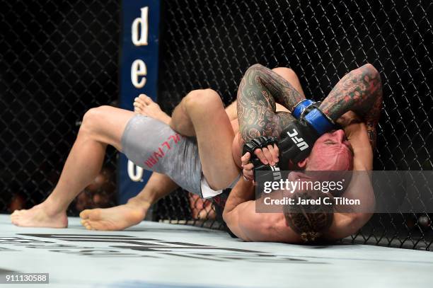 Niko Price submits George Sullivan in their welterweight bout during the UFC Fight Night event inside the Spectrum Center on January 27, 2018 in...