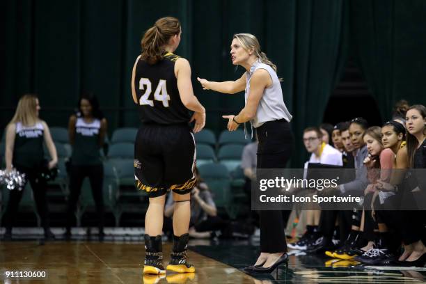 Northern Kentucky Norse head coach Camryn Whitaker instructs Northern Kentucky Norse guard Molly Glick during he third quarter of the women's college...