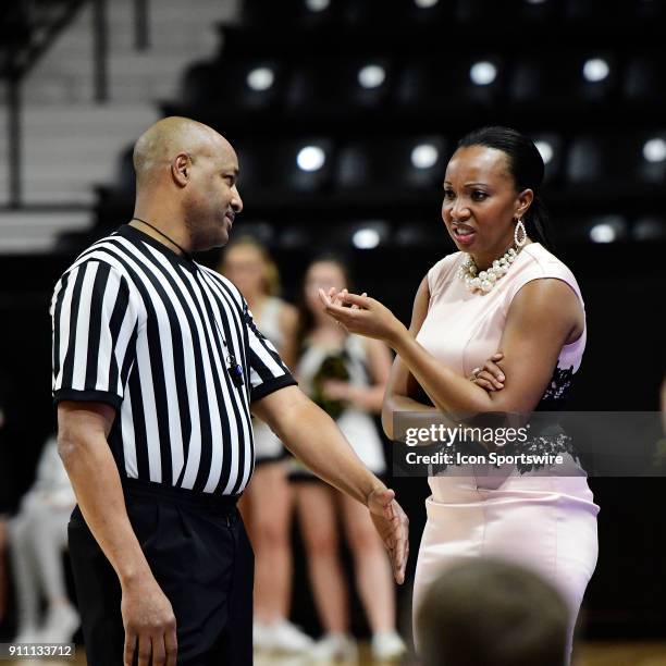 Jackie Carson womens basketball head coach Furman University Paladins discusses a reversed call with a referee during the game against the Wofford...