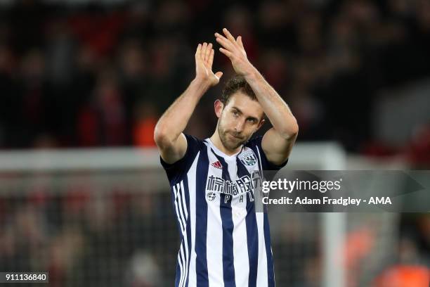 Craig Dawson of West Bromwich Albion applauds the travelling West Bromwich Albion Fans at the final whistle celebrating the 2-3 win over Liverpool...