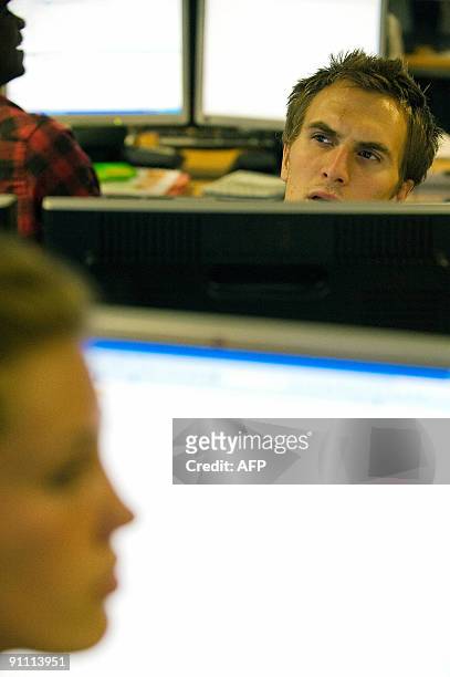 Students at University College London in central London begin lectures in the new virtual trading floor, on September 24, 2009. The trading floor...