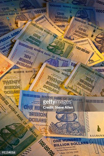 finance - hyperinflation - zimbabwe dollar stock pictures, royalty-free photos & images