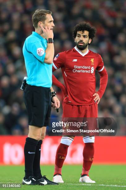 Mohamed Salah of Liverpool waits for referee Craig Pawson to make a decision during The Emirates FA Cup Fourth Round match between Liverpool and West...