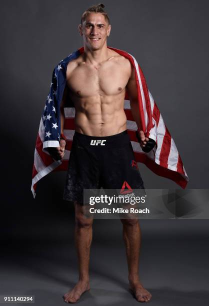 Niko Price poses for a post fight portraits backstage during a UFC Fight Night event at Spectrum Center on January 27, 2018 in Charlotte, North...