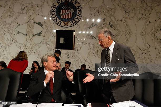 Senate Finance Committee Chairman Max Baucus and ranking member Sen. Charles Grassley talk before the start of a mark up session on the health care...