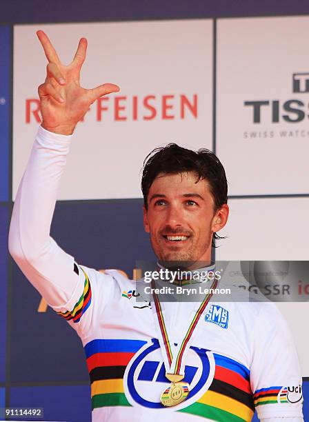 Fabian Cancellara of Switzerland stands on the podium with his gold medal after winning the Elite Men's Time Trial at the 2009 UCI Road World...