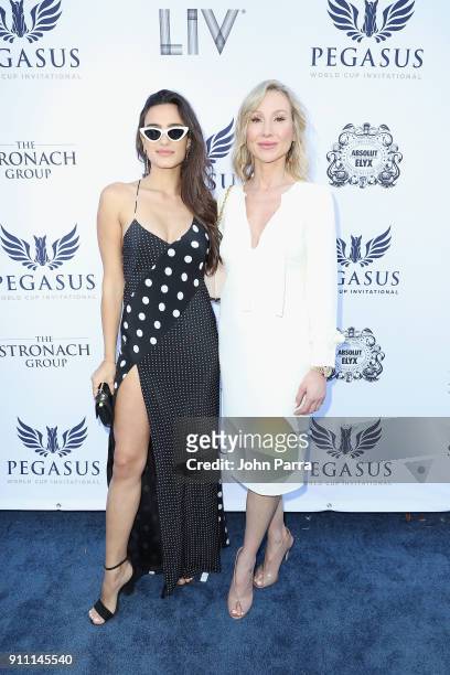 Isabella Grutman and Belinda Stronach attend The $16 Million Pegasus World Cup Invitational, The World's Richest Thoroughbred Horse Race at...