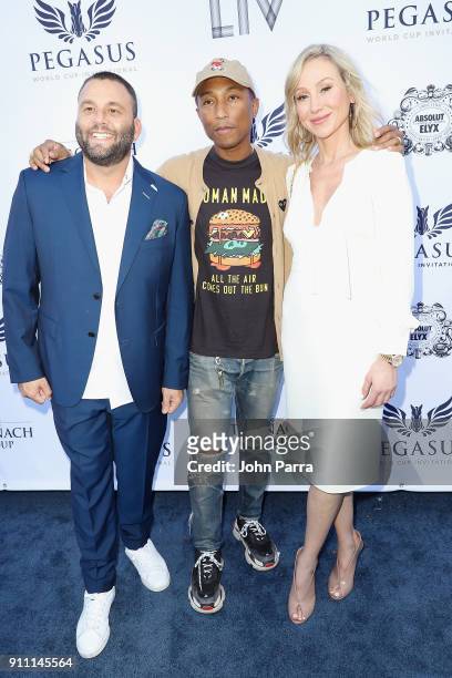 Dave Grutman, Pharrell Williams and Belinda Stronach attend The $16 Million Pegasus World Cup Invitational, The World's Richest Thoroughbred Horse...