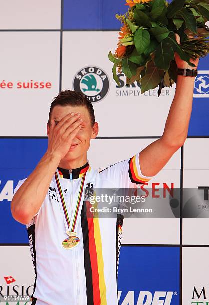 Tony Martin of Germany stands on the podium after finishing 3rd in the Elite Men's Time Trial at the 2009 UCI Road World Championships on September...