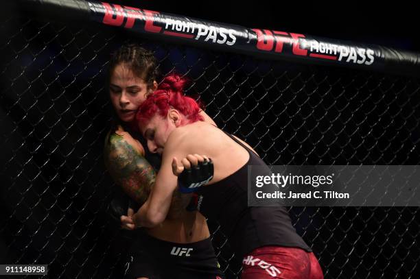 Randa Markos of Iraq presses Juliana Lima of Brazil in their strawweight bout during the UFC Fight Night event inside the Spectrum Center on January...