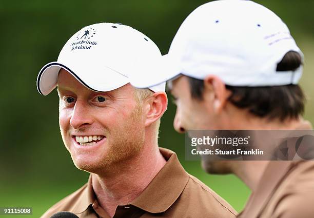 Simon Dyson and Oliver Wilson of the Great Britian and Northern Ireland team during the first day fourball at The Vivendi Trophy with Severiano...