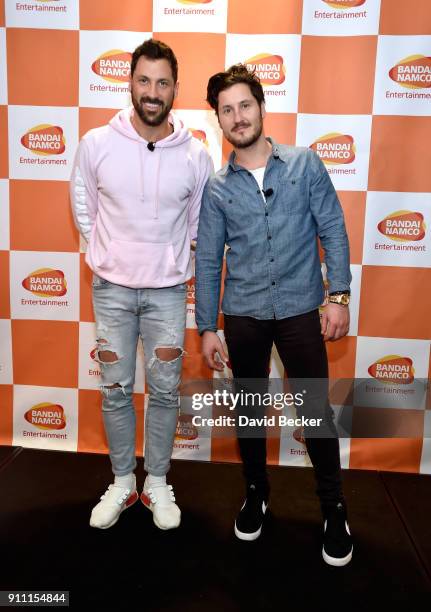 Dancers Maksim Chmerkovskiy and his brother Valentin Chmerkovskiy attend a news conference celebrating the 1st Anniversary of One Piece Thousand...