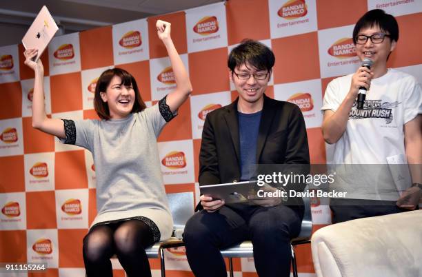 Product manager Seuson Sin, producer Kensuke Mita and product manager Yoshi Takabayashi attend a news conference celebrating the 1st Anniversary of...