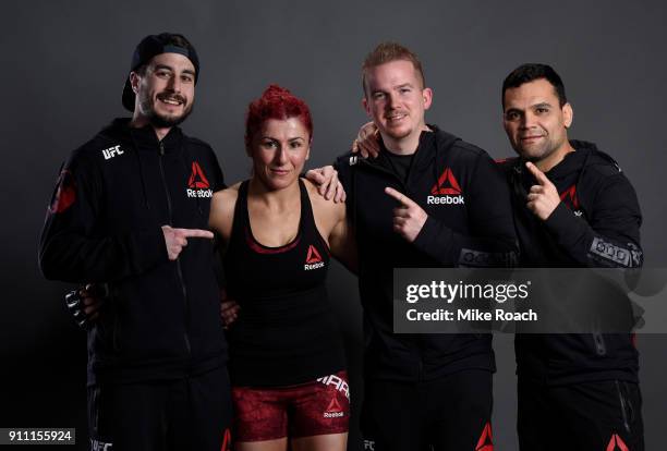 Randa Markos of Iraq poses for a post fight portraits with her team backstage during a UFC Fight Night event at Spectrum Center on January 27, 2018...