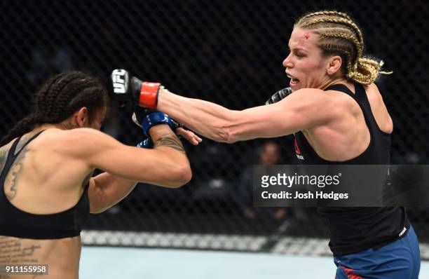 Katlyn Chookagian punches Mara Romero Borella of Italy in their women's flyweight bout during a UFC Fight Night event at Spectrum Center on January...